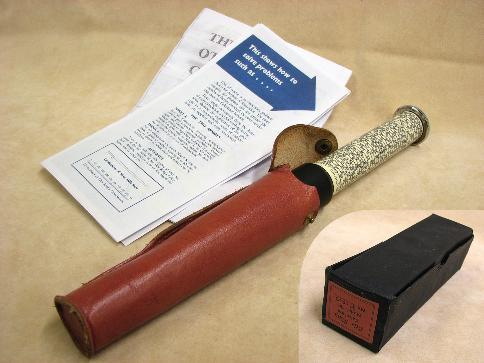 Early 1970's Otis King Model K type C leather cased cylindrical slide rule calculator